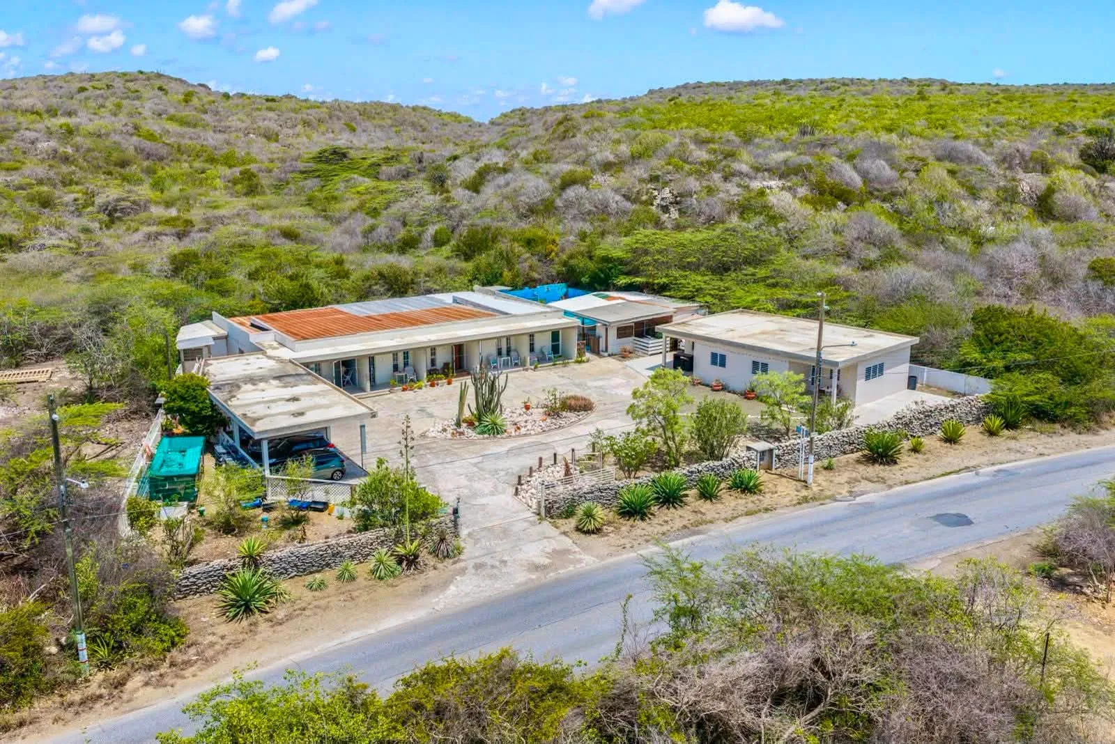 UNIEKE INVESTERINGSKANS OP CURAÇAO. RESORT MET 7 APPARTEMENTEN, ZWEMBAD EN 1.750 M² EIGENDOMSGROND
